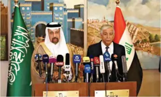  ??  ?? BAGHDAD: Iraqi Oil Minister Jabar Ali Al-Luaibi (right) and Saudi Energy Minister Khalid Al-Falih hold a joint press conference yesterday. — AP