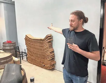  ?? ED SEMMLER/SOUTH BEND TRIBUNE ?? Blake Murray shows off the event space at Burn ‘Em Brewing, which recently relocated to a more visible location near Blue Chip Casino in Michigan City.