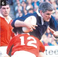  ??  ?? 6 – Wales’ John Devereux (12) tackles Finlay Calder in 1989;