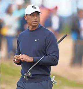  ?? THOMAS J. RUSSO/USA TODAY SPORTS ?? Tiger Woods’ goal in December was to be in the Top 50 so he could play at Firestone; his British Open finish left him at No. 50.