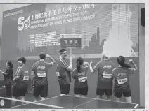  ?? PHOTOS BY GAO ERQIANG / CHINA DAILY ?? Amateur players from China and the US take part in a friendly table tennis event in Shanghai on Saturday to mark the 50th anniversar­y of Ping-Pong Diplomacy.