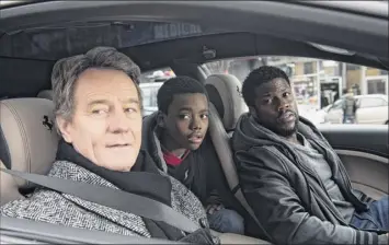 ?? David Lee / Stxfilms via Associated Press ?? This image released by Stxfilms shows, from left, Bryan Cranston, Jahi Di’allo Winston and Kevin Hart in a scene from “The Upside.”