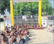  ??  ?? Students sitting outside the locked school at Bawdi Kalla village in Barmer district on Tuesday. HT PHOTO