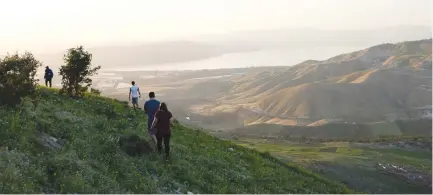  ??  ?? Hikers explore the scenery in Umm Qais in northern Jordan with views of the Golan Heights and Sea of Galilee. (Baraka)