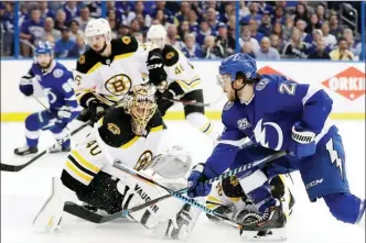  ?? The Associated Press ?? Tampa Bay Lightning center Brayden Point watches his shot get past Boston Bruins goaltender Tuukka Rask during the second period of Game 5 Sunday in Tampa, Fla. The Lightning won 3-1 to advance to the Eastern Conference final against either Washington...