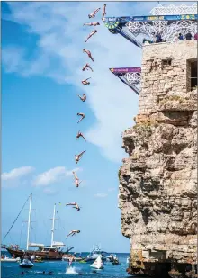  ?? ?? In a dive at Polignano, Hunt shows off his aerial magic.