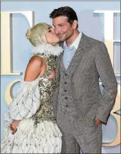  ?? TIM P. WHITBY / GETTY IMAGES ?? Lady Gaga and Bradley Cooper attend the UK premiere of “A Star Is Born” recently held at Vue West End in London.