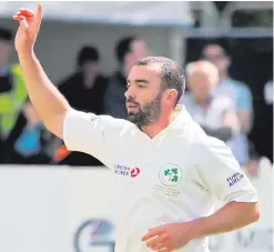  ??  ?? Howzat: Ireland’s Stuart Thompson celebrates after taking the wicket of Pakistan’s Faheem Ashraf for 83