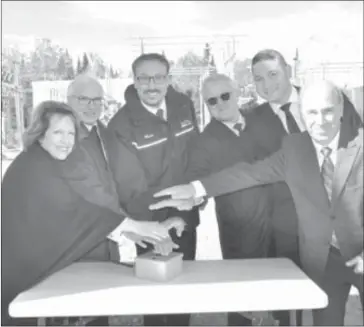  ?? (VILLE DE SHERBROOKE) ?? Above, from left to right, Hydro-sherbrooke Executive Committee member Chantal L'esperance, Hydro Board Chair Julien Lachance, Sherbrooke Mayor Steve Lussier, Christian Laprise, Director of Hydro-sherbrooke, Mathieu Valiquette, Project Engineer, and Denis Roussin, Head of the Engineerin­g Division