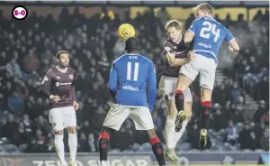  ??  ?? 0 Greg Stewart outjumps Christophe Berra to head home his second of the game.