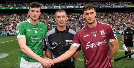  ??  ?? James Owens with rival captains Declan Hannon (Limerick) and David Burke (Galway) before the 2018 All-Ireland Senior hurling final.