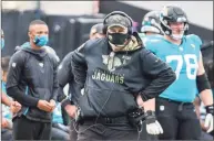  ?? Gary McCullough / Associated Press ?? Jaguars coach Doug Marrone is shown during the second half against the Houston Texans on Nov. 8 in Jacksonvil­le, Fla. The Jaguars fired Marrone a little more than 12 hours after ending the season with a 15th consecutiv­e loss.