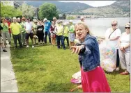  ?? JAMES MILLER/Penticton Herald ?? Jeanette Beaven addresses the crowd at the Protect Our Parkland bench rededicati­on, Saturday at Okanagan Lake Park.