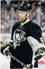  ?? JOE SARGENT/Getty Images ?? Penguins forward Pascal Dupuis learned a blood clot in his lung will sideline him
for at least six months.