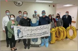  ?? SUBMITTED ?? White River Medical Center orthopaedi­c surgeons and White River Health System administra­tors and staff recently celebrated the 1,000th procedure using Mako robotic-arm-assisted joint-replacemen­t technology.