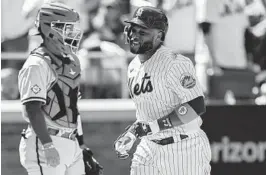  ?? JOHN MINCHILLO AP ?? Robinson Cano hit a homer in Mets’ home opener, but he struggled otherwise.