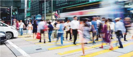  ?? ISTOCK ?? À Hong Kong, la sécurité des piétons passe par l'instaurati­on de feux de signalisat­ion intelligen­ts.