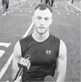  ?? KEVIN RICHARDSON/BALTIMORE SUN ?? Former Maryland men’s lacrosse standout Jared Bernhardt talks with the media at Maryland’s pro day in March.