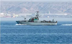  ?? (Ammar Awad/Reuters) ?? AN ISRAEL NAVY gunboat patrols off the Eilat coast yesterday.
