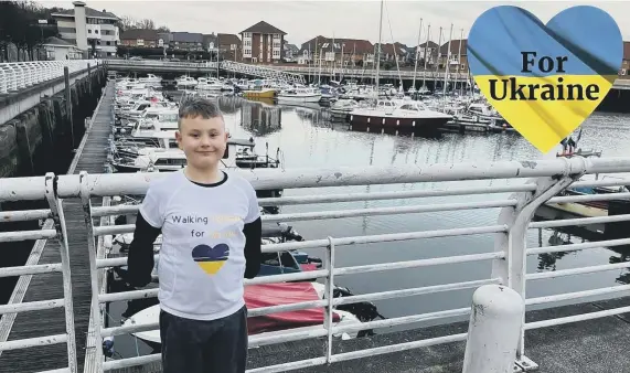  ?? ?? Leland Brannigan, seven, is walking 100 miles in a month to help refugees from Ukraine.