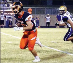  ?? Photo by Randy Moll ?? Gravette’s Austin O’Brien breaks through the Berryville line and runs down the sideline to the goal in the second quarter of Friday night’s homecoming game in Lion Stadium.