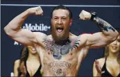  ?? JOHN LOCHER — THE ASSOCIATED PRESS ?? Conor McGregor and Dustin Poirier will fight in UFC’s first sellout show in Las Vegas since the start of the pandemic.