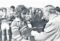  ??  ?? Captain Peter Harper receives the Cheshire Shield after the Colts achieved an historic win
