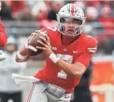  ?? ADAM CAIRNS/COLUMBUS DISPATCH ?? C.J. Stroud threw for 432 yards and a school-record six TDS in just over a half against Michigan State, putting him atop many Heisman projection­s.
