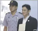  ?? CHUNG SUNG-JUN — THE ASSOCIATED PRESS ?? Samsung heir Lee Jae-yong was accused of offering $38 million in bribes in exchange for government help with a merger.