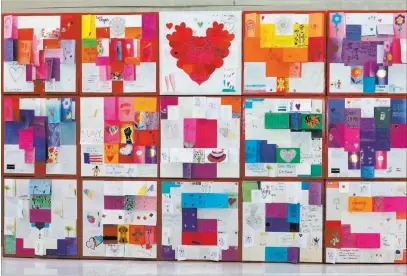  ?? Michael Quine ?? Las Vegas Review-journal @Vegas88s Using many of the thousands of cards, letters and hearts sent to Las Vegas after the Oct. 1 shooting, artist J.K. Russ created a modular display on the second floor of Las Vegas City Hall.