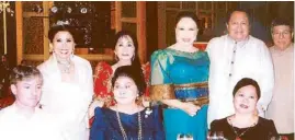  ??  ?? (Seated) Michael Colangelo, Ilocos Norte Rep. Imelda Marcos and Charo Yu; (standing, from left) Tereret Liboro, Baby Antonio, Minerva Tanseco, Ado Escudero and Boysie Villavicen­cio.