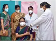  ??  ?? File photo of Kerala Health Minister K.K. Shailaja getting her first dose of Covid-19 vaccine during the second phase of vaccinatio­n in Thiruvanan­thapuram on 2 March 2021. ANI