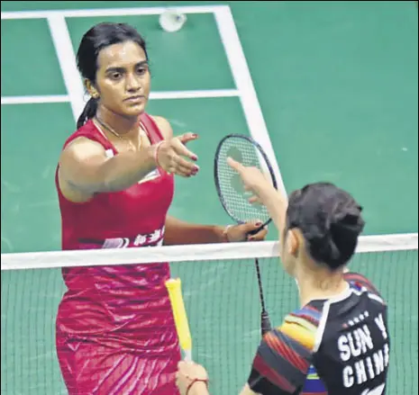  ?? AFP ?? India's PV Sindhu shakes hands with China's Sun Yu after her win in their women's singles quarterfin­al at the BWF World Championsh­ips at Emirates Arena in Glasgow on Friday.