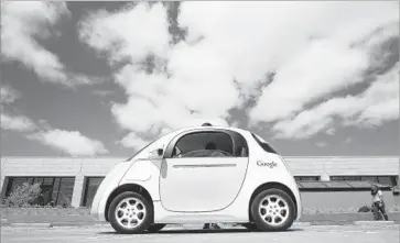  ?? Tony Avelar Associated Press ?? AS OF OCT. 11, 18 companies including Google, Tesla and Ford had permits to test autonomous vehicles on California public streets. Above, a self-driving car at the Google campus in Mountain View, Calif., last year.