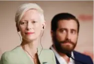  ?? GETTY IMAGES ?? Tilda Swinton and Jake Gyllenhaal attend the Okja press conference during the 70th annual Cannes Film Festival.