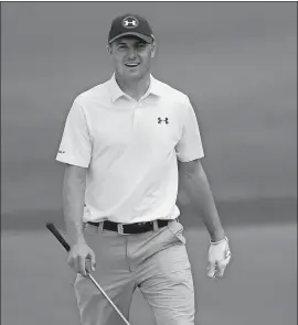  ?? CHRIS CARLSON/AP PHOTO ?? Jordan Spieth walks onto the 15th green during a practice round this week at the PGA Championsh­ip at the Quail Hollow Club.