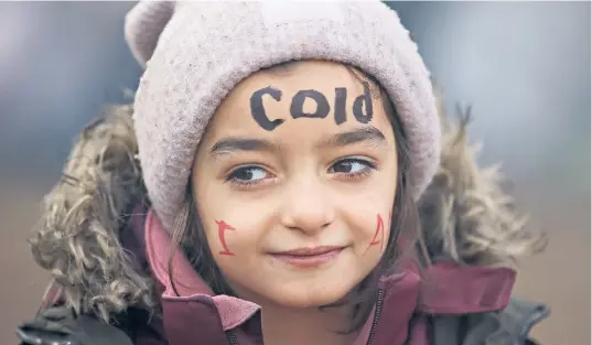  ?? ?? A migrant child in a refugee camp on the Belarusian­polish border