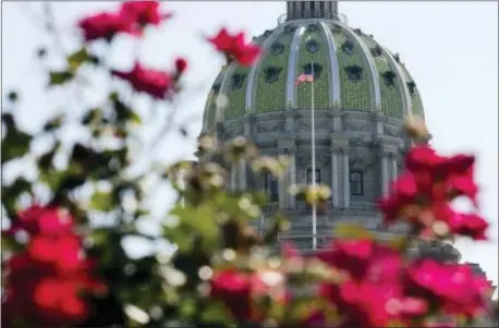  ?? ASSOCIATED PRESS ?? The Pennsylvan­ia Capitol building is seen in Harrisburg, Pa. The state budget is one step closer to being resolved after the Senate approved a funding package Thursday. It now goes to the House.