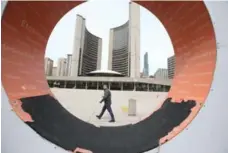  ?? VINCE TALOTTA/TORONTO STAR ?? Parts of letters of the Toronto sign at Nathan Phillips Square show deteriorat­ion in places where people sit and climb to take photos.