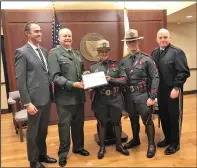 ?? R.I. State Police photo ?? From left, Thomas Klump, chairman of the Rhode Island Employer Support of the Guard and Reserve (ESGR); Phil Albert, an Army Vietnam Veteran who is vice chairman of the Rhode Island Employer Support of the Guard and Reserve; Col.Ann C. Assumpico,...