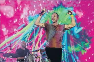  ?? MAJA SMIoJKO SKA / Reu e ?? Chris Martin, durante un concierto ofrecido en Wembley el pasado verano