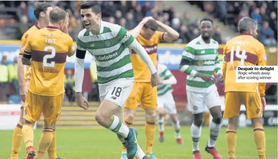  ??  ?? Despair to delight Rogic wheels away after scoring winner