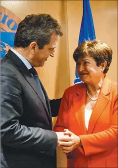  ?? MECON ?? ANUNCIOS. Massa en la conferenci­a de ayer y en Estados Unidos junto a la titular del FMI, Kristalina Georgieva, quien elogió que tenga el control de la botonera en la economìa nacional.