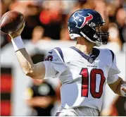  ?? RON SCHWANE/AP ?? Houston Texans quarterbac­k Davis Mills, a Greater Atlanta Christian graduate, struggled early Sunday in Cleveland and threw an intercepti­on on his second possession but bounced back to throw a touchdown pass.