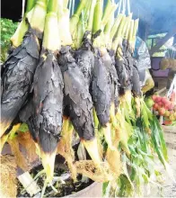  ??  ?? JAGUNG bakar yang sedia dijual kepada pengunjung.