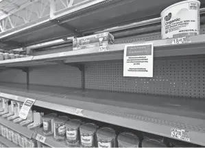  ?? ERIC GAY/AP FILE ?? To explain the formula shortage, experts point to decades-old policies that favor a small number of corporatio­ns.