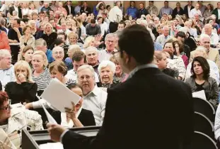  ?? Houston Chronicle file ?? Briargrove residents react as they listen to Tory Gunsolley, president and CEO of Houston Housing Authority, during a meeting in March at which residents voiced opposition to a mixeduse project that would include some low-income housing.