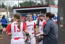  ?? Brooke Alt/file photo ?? Shelby coach Sami Martin spoke about her team’s victory that featured 21 hits.