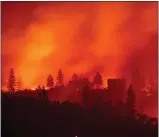  ?? GETTY IMAGES ?? The Camp Fire rages on Nov. 11. The effects of climate change will get worse unless more drastic action is taken, a major U.S. government report warned last week.