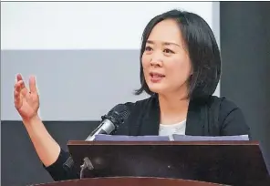  ?? PROVIDED TO CHINA DAILY ?? Diane Wang, founder and CEO of DHgate, introduces the APEC Cross-Border E-Commerce Training Workshop (CBET) in Papua New Guinea.